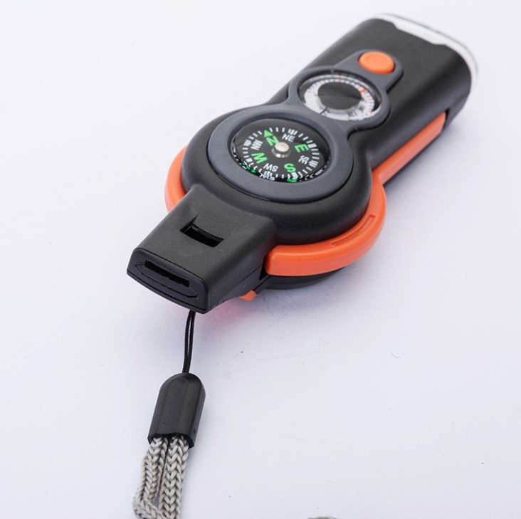 7 in 1 Survival Whistle with LED lamp, Compass, Magnifying glass, Reflector, Thermometer and Sealed bin Function